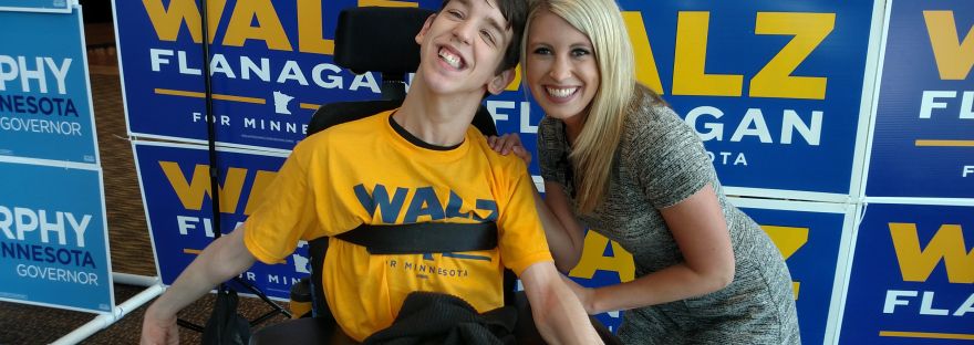 Justin with reporter Noelle Anderson smiling