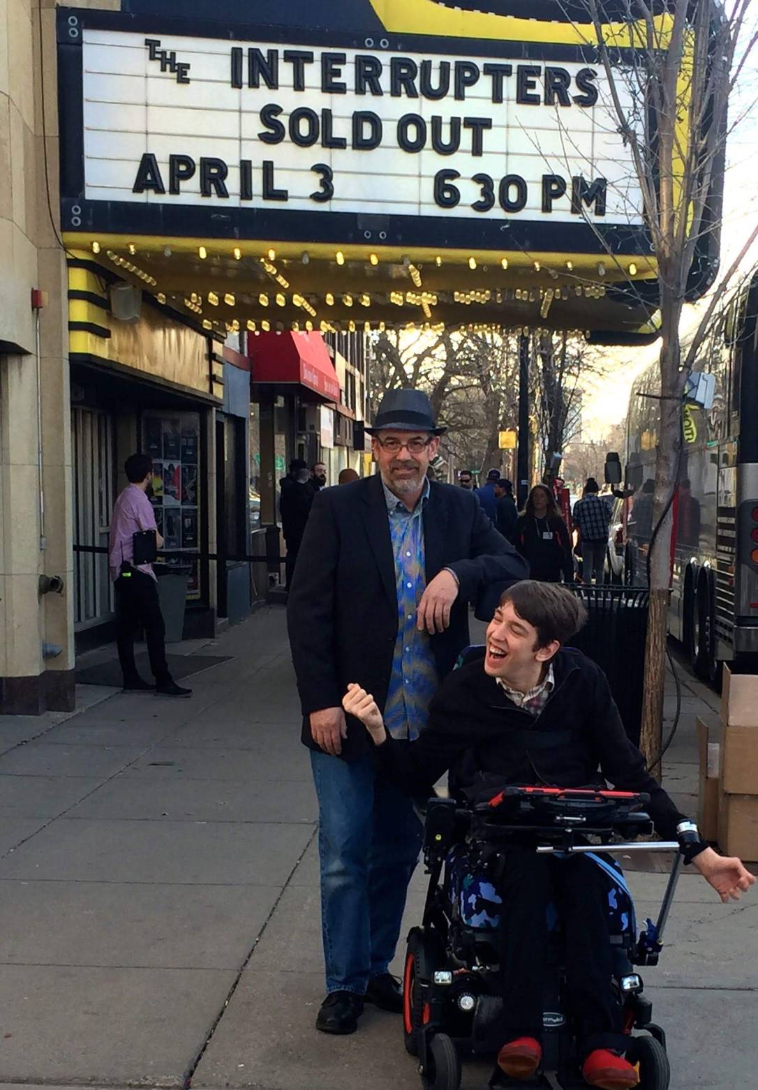 Justin and dad in front of theater marquis for sold out Interrupters April 3