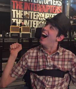 Smiling Justin in front of stage