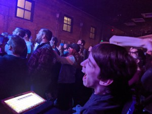 Justin smiling in crowd