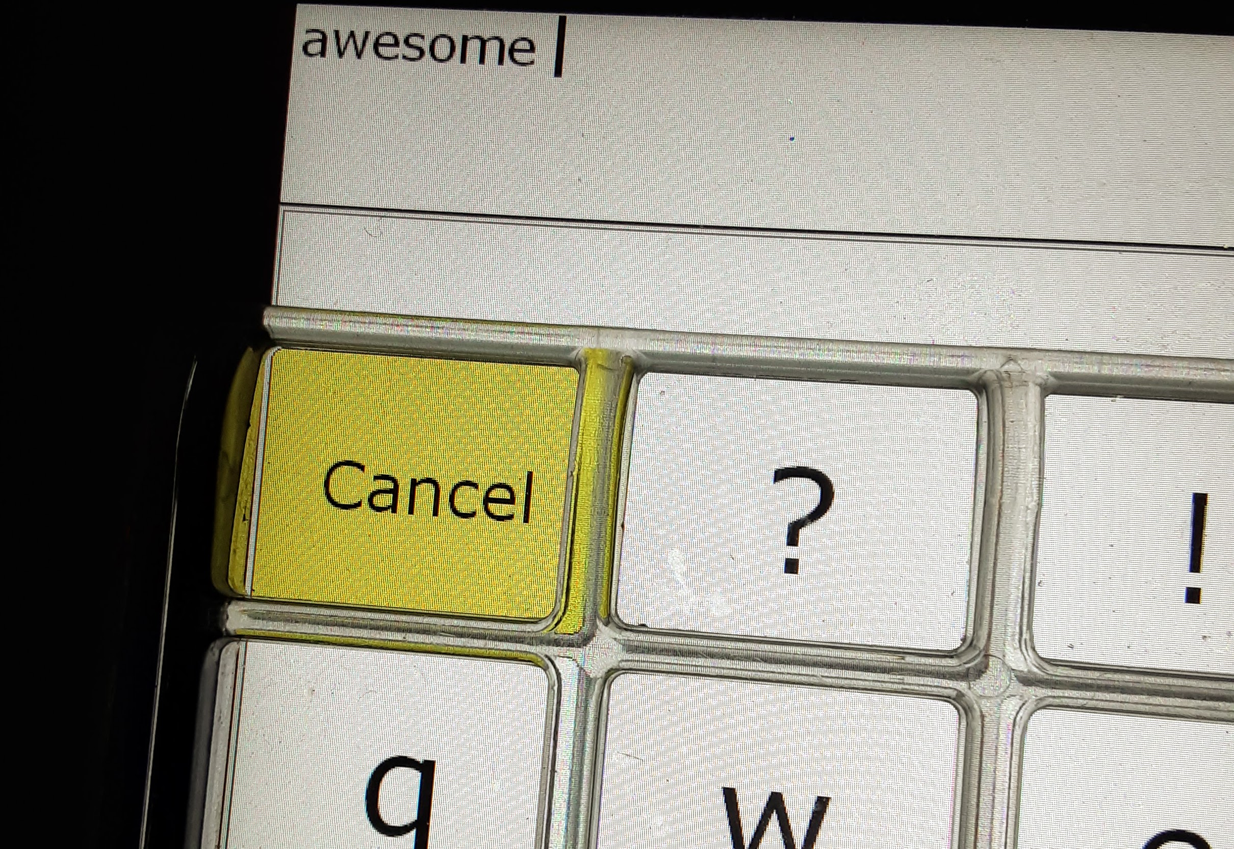 Augmentative Communication Device that says "awesome" in the message bar